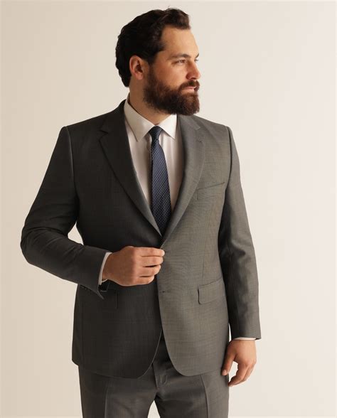 Traje chaqueta gris Continuara.org