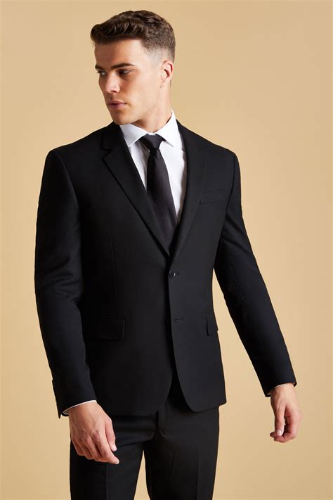 Traje chaqueta negro Continuara.org