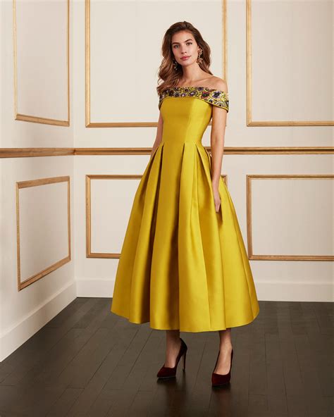 Traje coctel Continuara.org