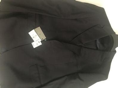 Traje marca emilio Continuara.org