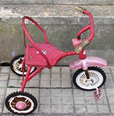 Triciclo antiguo nino Continuara.org