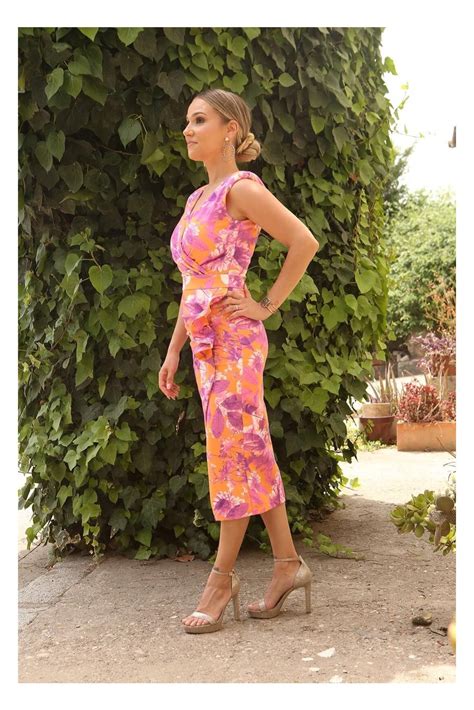 Vestido naranja marca Continuara.org