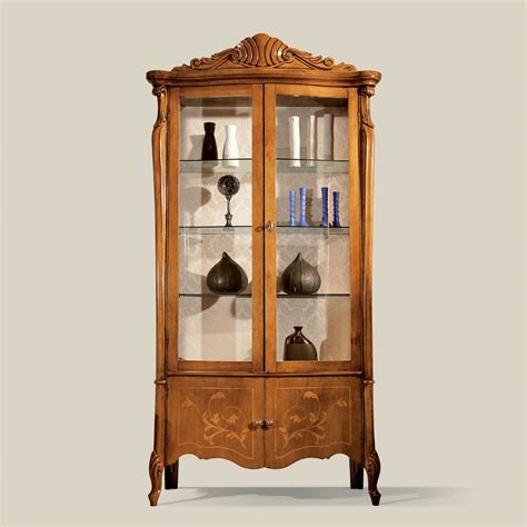 Vitrina madera puerta Continuara.org