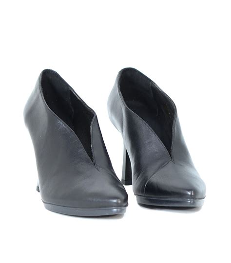 Zapatos abotinados Continuara.org