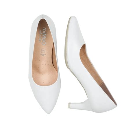 Zapatos blanco elegante Continuara.org
