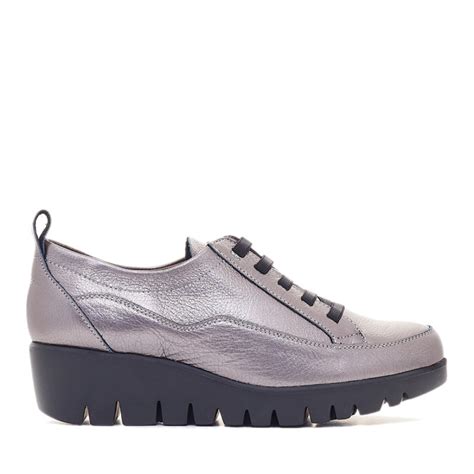 Zapatos cuna gris Continuara.org