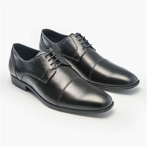 Zapatos negro Continuara.org