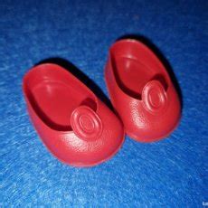 Zapatos rojos boton Continuara.org